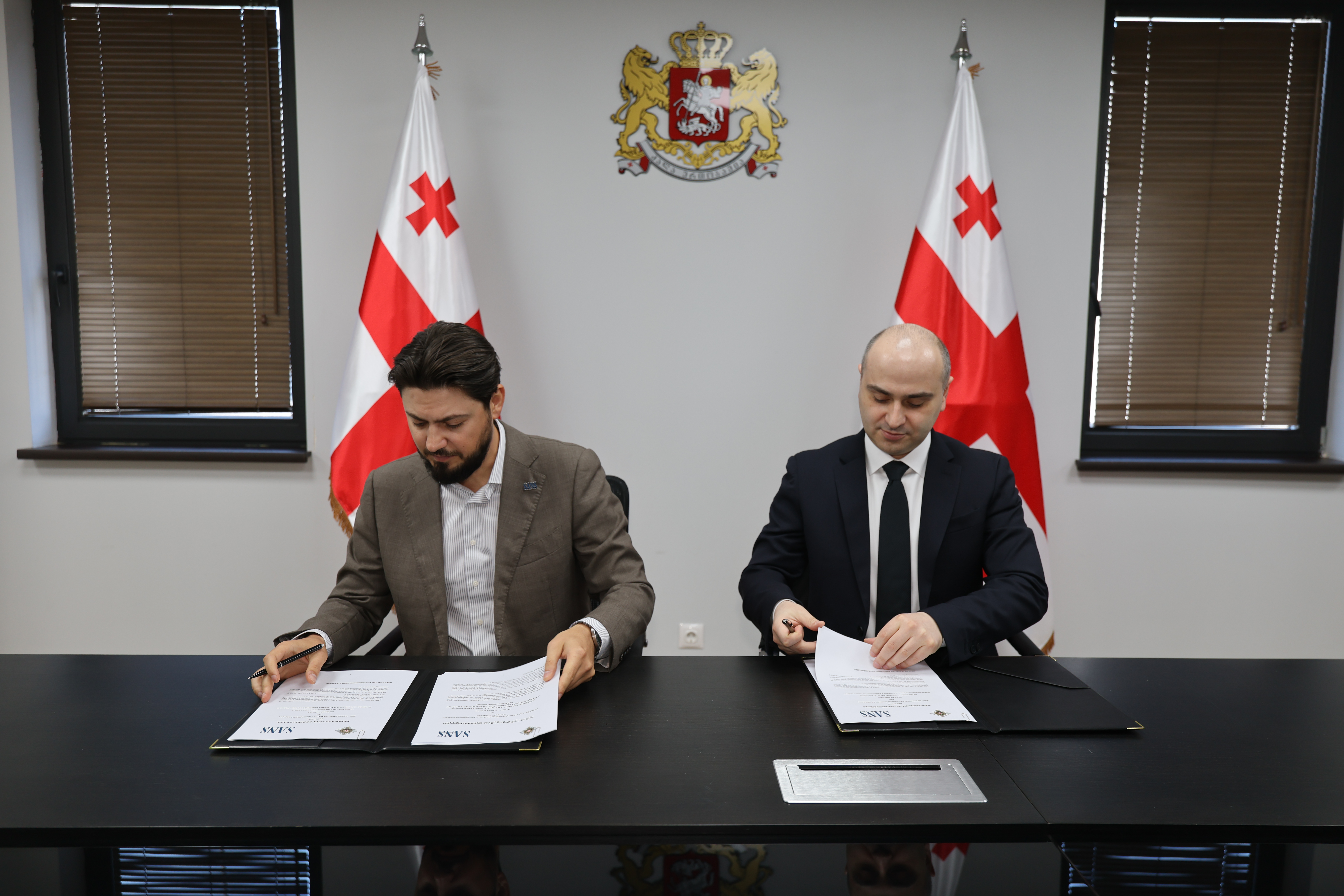 Signature of the Memorandum of Understanding with SANS Institute — 2